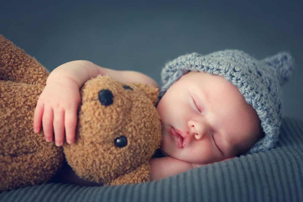 when can baby sleep with stuffed animal