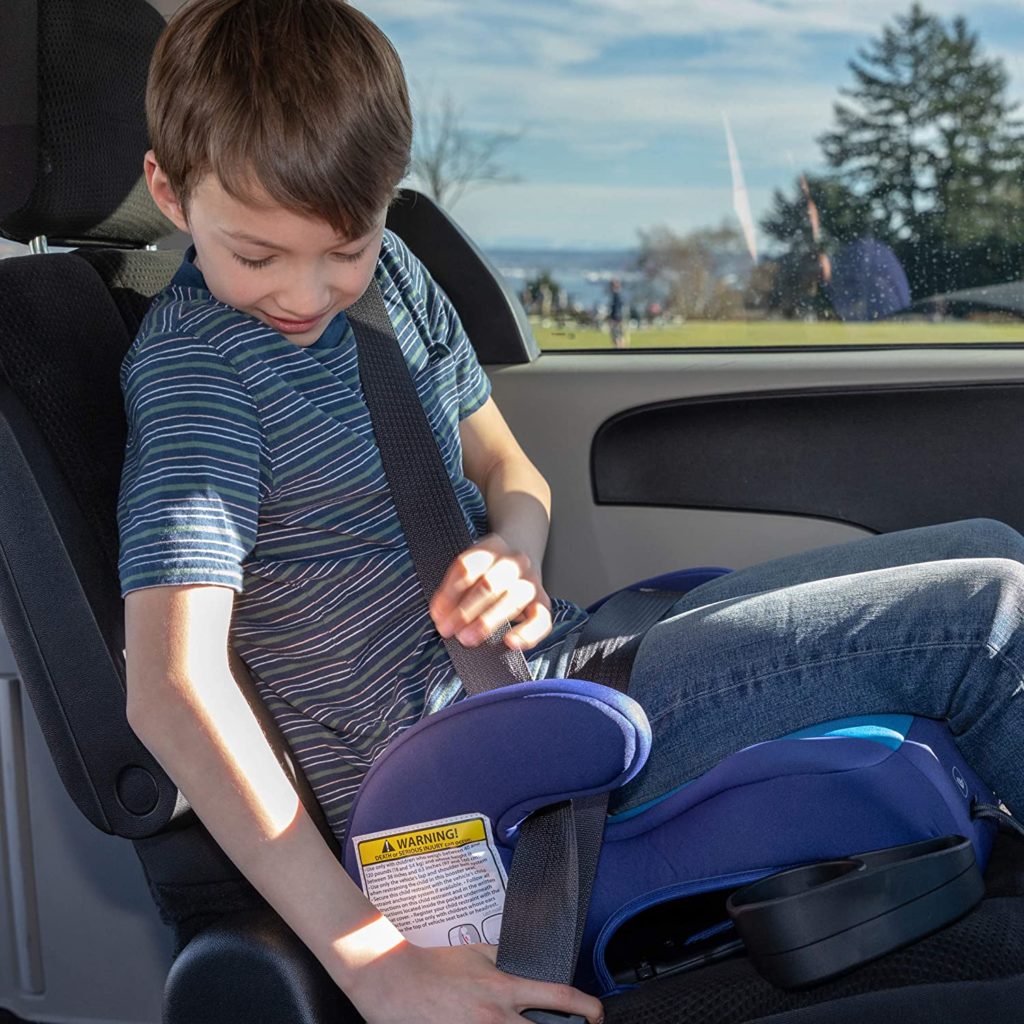 kid with backless booster car seat